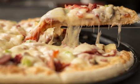 Mejores Pizzerias -Porcion De Pizza